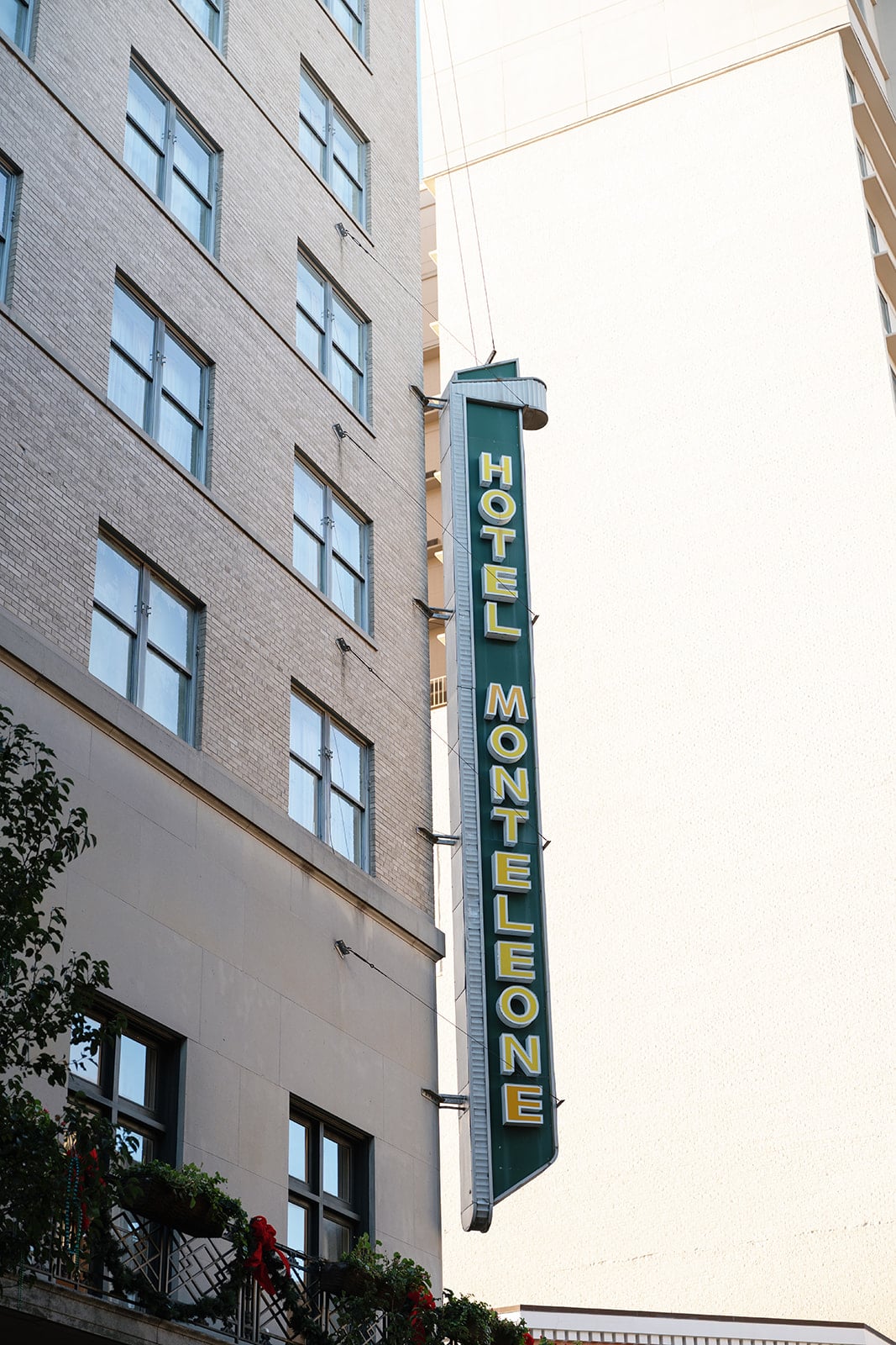 Hotel Monteleone vertical sign on the classic brick building in New Orleans.