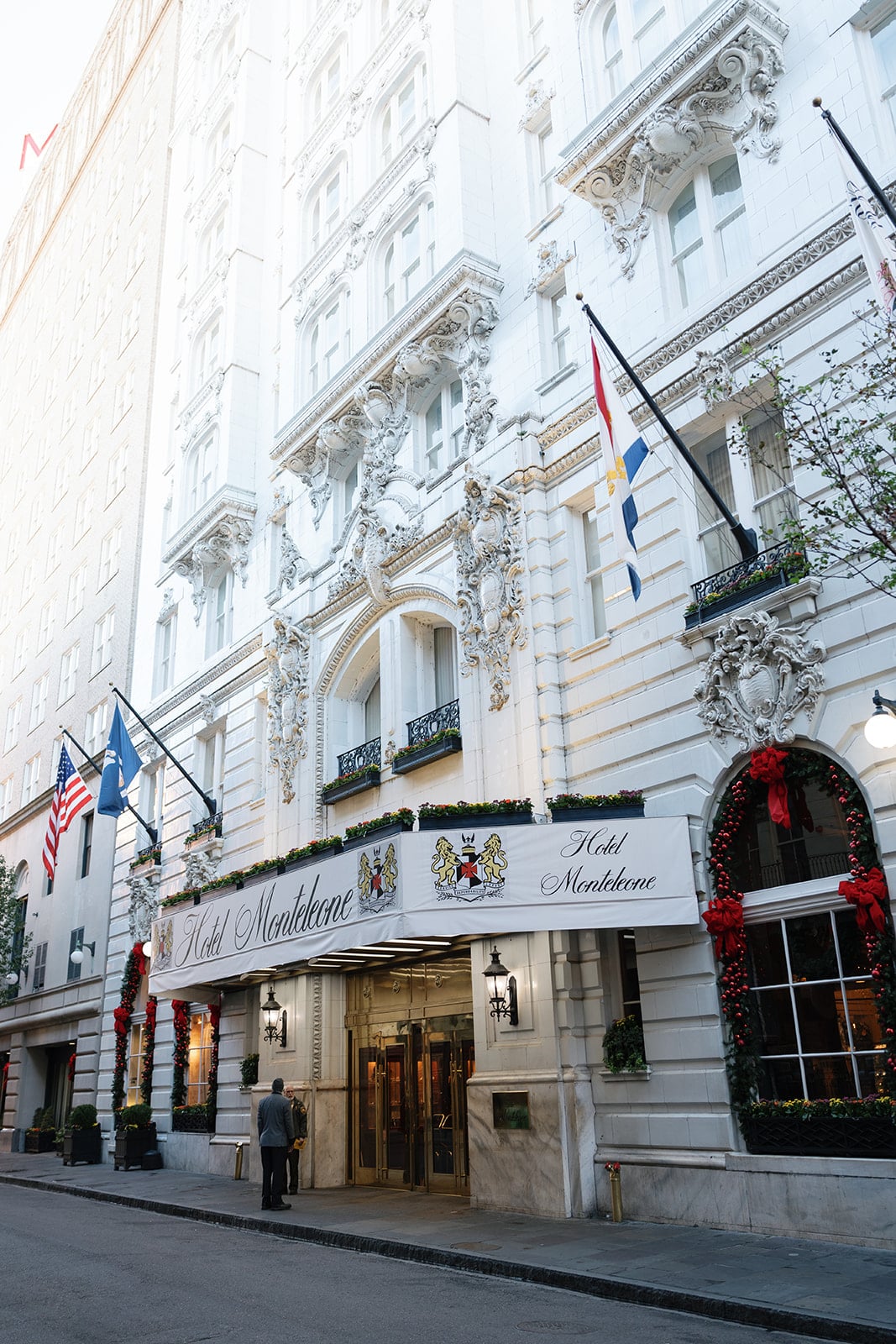 Hotel Monteleone New Orleans, grand white building with ornate details and holiday decor
